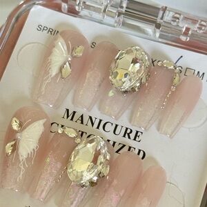 New- handmade press on nail with design.